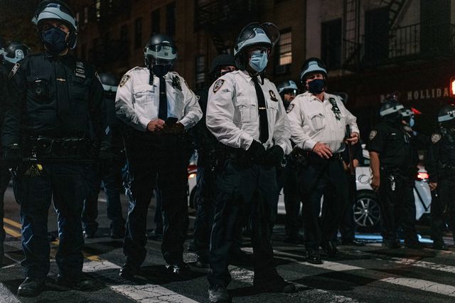 Cops guarding the protest on Friday night.
